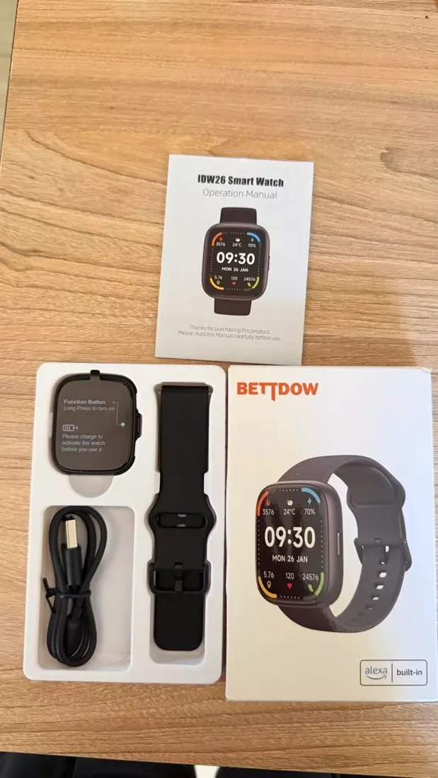 Orologio nero con confezione, cinturino, cavo e manuale